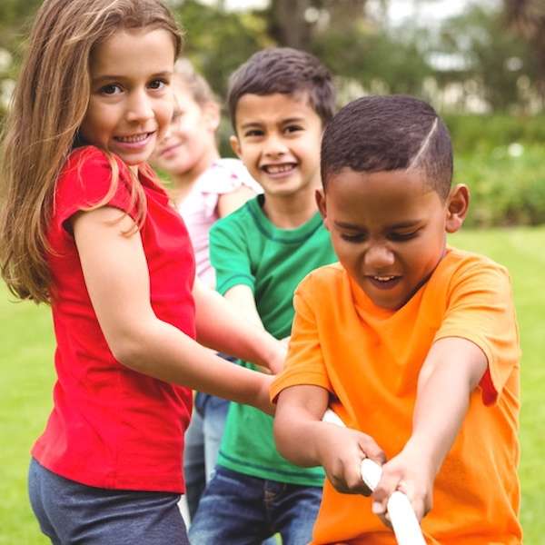 A group of children playing an active party game together